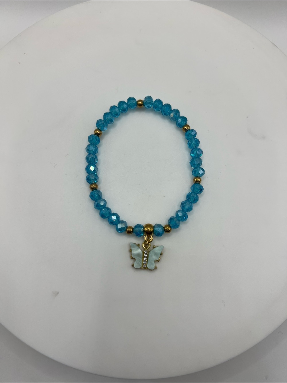 752. Blue Crystal Butterfly Charm Stretch Bracelet 6 1/2”